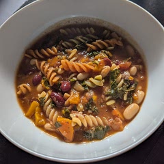 Replaced a little of the veg broth with beef to give it a bit more flavor. I think zucchini might work well with the flavors. 
Everyone ate it!