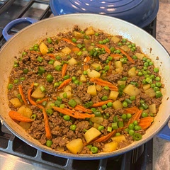 Use a ton of curry powder. Carrots add nice color. 10 minutes was right for the potatoes. Served over rice.