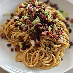 Really tasty and has become a go-to dish! So easy to make.

I garnished with toasted sesame seeds as well as the spring onions, and also just used spaghetti as I didn't have angel hair.