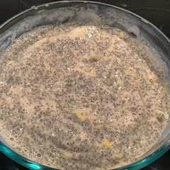 Made date syrup in blender, added soy milk, blended again. Then added frozen mango to blender and ran it just long enough for small mango chunks to remain.  Added to the bowl of chia seeds.  Stir well, wait a few minutes and stir again.  Needs to refrigerate for several hours.