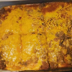 Substituted ground venison for beef and refried beans for regular pinto beans.  I also used flour tortillas because we prefer them over corn.  This was really good and pretty easy to make.  