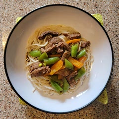 One of the recipes we use to eat up the snap peas from our CSA. A bit spicier than our usual fare and delicious. 