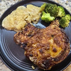 I used bone in pork chops and spiced them with salt, pepper, garlic powder, and paprika before sautéeing them,  since they are more tender than boneless, and other reviews said the dish was bland and dry.  I sautéed the onions before mixing with the potatoes.  I sliced the potatoes thin, and they were cooked just right.
Still, it wasn't my favorite dish for dinner. 