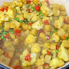 My fresh ginger had gone bad so I just added a few shakes of ground ginger with the other dry spices. I also added some chopped grape tomatoes and frozen peas. Delicious!