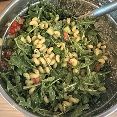 I blend the red onions and one avocado plus garlic cloves into the dressing in a smoothie cup. Any pasta works though I like ones which have grooves for dressing. Halloumi on the side makes this vegan 🙂