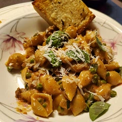 Not hamburger helper, but italian comfort food.  I upped the sauce by using homemade marinara as the tomatoes and added peas like the video and it was excellent! 