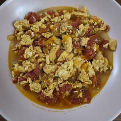 This was easy and very good! I used 4 medium homegrown beefsteak tomatoes for 6 eggs, substituted sherry vinegar since it's what I had, and halved the amount of sugar. Forgot to serve it over rice but it was great as is. Topped with a little soy sauce and Sriracha. Next time I would increase the green onion and try adding chili crisp.