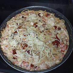 For the most part followed the recipe but took the advice of a couple others: rinsed and drained tomatoes after dicing;  added some onion salt and garlic powder and cut down on the paprika and red pepper. 
Added mozzarella in with the Parmesan

