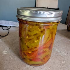 I used hot banana peppers for this and it turned out fantastic! I followed the recipe exactly and it turned out syrupy and delicious (and REALLY spicy). I did add some pickle crisp granules to keep the peppers from getting mushy and they seem to have worked. Really great recipe. 