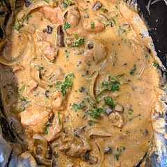 And I bought a crockpot the other day because I simply don’t prefer my instant pot for a slow cooker. It just isn’t the same.  So I got a big oval slow cooker with a manual settings and made this really super easy pork dish.  I added a whole onion in this case, about 6 tablespoons of minced garlic because I’m a super garlic fan, and I also threw three (3) fresh sprigs of rosemary into the pot.  I had cut up whole pork loin so I had pork chops that are boneless and I ended up with a little more than 2 pounds of cubed pork loin - cut into large stew meat style pieces.  I doubled by cream of mushroom soup for more sauce and out of the golden mushroom soup with a package of dried Lipton onion soup mix with about 3 tablespoons of water.  I didn’t really even eat water by the time it was done because the sauce was fabulous and the dinner was excellent!  TIP: I did not cook these 2 pounds of stew meat style pork for 6 to 8 hours. Generally speaking, you should be only cooking it for 6 to 7 hours.  Because of my pieces, I only slow cooked for three hours, and my pork came out perfectly moist.  

I feel like if I had done six hours for either the boneless pork chops or the stew meat, I would’ve had very dry meat that tasted like sandpaper. If you’re using a whole 2 pound piece, then I would put it on for six hours and check temp.  Chef’s temp on pork is 140° instead of 145°.  I pulled the vessel out of the crockpot unit so it would not continue to cook and let it sit until my husband came home from work - about an hour and a half.  I started early because I wasn’t sure the cook time.  At the end, I threw through curly parsley for that peppery flavor and served it over brown rice.  This is easy and delicious and definitely on a rotation.  Believe it or not, it’s got a great health score at 7.7!  That’s pretty good for a crockpot dish!
