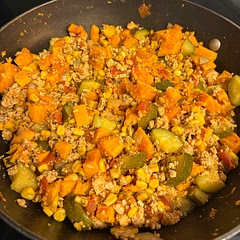 I added some more salt, pepper, chili powder, a bit of oregano and smoked paprika. I microwaved the sweet potatoes for a while beforehand to get them softer. I replaced the black beans with zucchini.