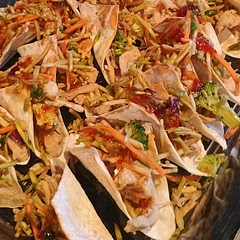 Mix the sweet chilli sauce into the coleslaw before putting it on the wontons to make it easier. Also, only cook the wontons for 7 -8 minutes and use the muffin tins to make Taco shaped shells instead of cups. 8/10