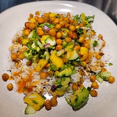 This was excellent. I cooked the chickpeas and tofu on convection. Chickpeas took about 20-25 min and tofu 15 min. I didn't add maple syrup to the dressing as it was sweet enough as is. Could easily replace tofu with chicken and season it the same way. 