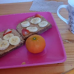 This how I made peanut butter toast with banana and strawberries use peanut butter with no add sugar and salt get brown bread and toast it and cut some banana and strawberries and have it with green and orange