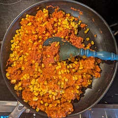 I think it needed sauteed onion and more garlic powder.I didn't have mixed vegetables and I wouldn't want them in something like this being used as a filling for burritos or as a side for tacos or tostadas.  I used a drained can of corn instead.  I am going to put packages of this in freezer for burritos or chimichangas, tacos or tostadas.  Makes a huge amount.  I wanted to use up a partially used bottle of V8 that was in refrigerator and decided to try this recipe.
