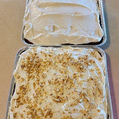 Used half the amount of sugar in both the cake and frosting. Used whipped topping into the frosting to make it creamy