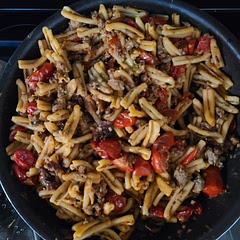 Turned out great. A nice way to get rid of some old tomatoes from the garden. I cheated and added sausage instead of mushrooms. Could use a bit more salt. I also added red chile flakes and klamata olives.