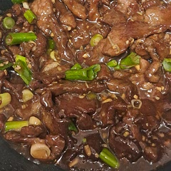 Thinly sliced short rib and added sesame oil. 