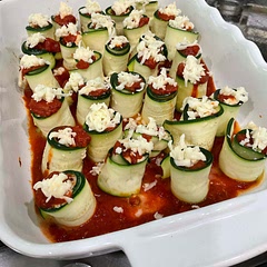 The mandolin was essential to slicing the zucchini. Roll them and lay them down, not standing like little barrels.