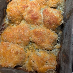 I used half Greek yogurt, half mayo. Then half parm, and half sharp cheddar. I didn't have buttermilk so I added a tablespoon of white vinegar to my milk switch is a cheat to make it. I also added panko bread crumbs to the mixture and sprinkled more on top. Came out amazing!