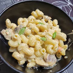 Used half the amount of tomatoes in the recipe to make the sauce , then added quartered fresh mushrooms to the pasta dish itself. Turned out really light and nice!