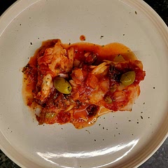 I cooked the fish in the sauce. Added pickled hots and olives.