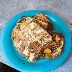 Added a bit of cinnamon. First two slices were good, but the rest were bad. Too much butter and too much egg, I think. The butter burned and it cooked the toast itself more than the egg mixture, making the majority of them too wet and taste like raw egg.