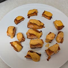 If your oven has a broil setting high or low, I did high for 10 minutes and they turned out perfect. It's a very simple salmon dish that could pair nicely with a side of rice. The sauce is a pretty thick consistency, you can't really drizzle it. It's more of a dollop that you put onto the bites. 