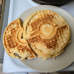 Nice and fluffy. Depending on what waffle iron you use, you may end up with an odd number of waffles, so be sure to divy up the last waffle as necessary.