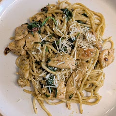 Made with spaghetti, added spinach, basil and sundried tomatoes. 