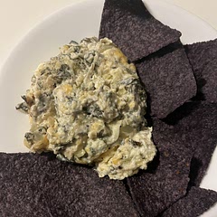 Served it with blue corn tortilla chips. It was great. Special request from my teen son. I add seasonings and extra sharp cheddar and asiago cheeses, and I sauteed fresh spinach. 