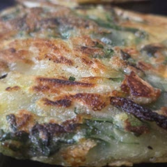 The best thing about yachaejeon is that you can make it with whatever veggies you have on hand. Tonight, I made mine with sweet onion, Japanese sweet potato, bok choy, yellow summer squash, and Snow White mushrooms. You can always add some well-drained, chopped kimchi. I also add a little sesame oil to the dipping sauce. The pancakes do take a long time to cook. I really recommend making many smaller pancakes than one large one. My family loves yachaejeon, and I make it often.