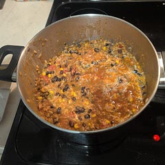 This recipe was delicious! All being in one pot and being relatively hands off besides light prep and opening cans makes this a win on a busy night. Had to double up on the spices to taste, drain excess broth and added more garlic. My girlfriend says it basically tastes like a Mexican chili. 8/10!