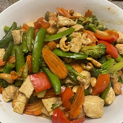 I would make a few changes if I made it again, add peanut sauce to cooked chicken and let simmer a bit before adding veggies. Definitely use natural PB and add cashews before serving.
