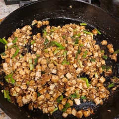 It was my first time making it, and I stayed true to the recipe. I made 2.5x the recipe for 6 people, and it was about right for minimal or no leftovers. I would follow most of the recommendations and double the sauce, especially over rice. I've made a decent amount of tofu, but this recipe surprised me with how long it took to brown it, then all of a sudden it was done. Start to finish, it took about 45 minutes. I thought the tofu tasted fantastic, but it was too spicy for one of my 3 kids. Will definitely make again with doubled sauce, and half the red pepper