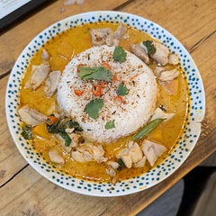 Was absolutely incredible, I doubled the chicken to get more protein and also added a lot more water since my coconut milk was canned. I used the recommended curry paste brand and bloomed it with the aromatics as described. I left a spring of lemongrass in there for flavor and also added some chopped chillis in the mix. I used butternut squash instead of pumpkins. With prep included this took me about 1.5 hours but it should take me 30 minutes less next time now that I know what I'm doing.