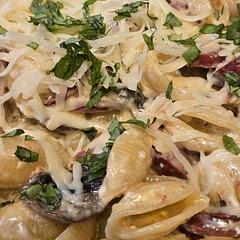 Added mushrooms that I had to use up in the fridge and fresh basil...very good!