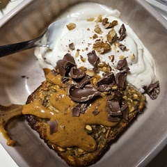 added pepitas and van extract. topped with yogurt, pb and chocolate