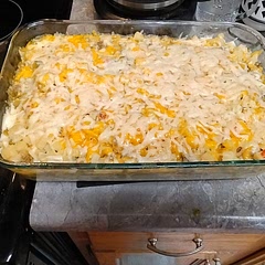 Doesn't look like it turned out too bad but I did screw up and forget to add the sausage, chili, pepper and cheese mixture into the tortillas with the eggs so I ended up just putting it all on top and adding more cheese I added.  Monterey jack cheese and pepper jack.