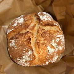 I baked mine in a deep cast iron skillet with a cast iron lid. Turned out great!