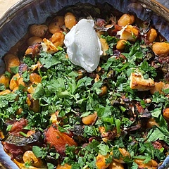 Would add some extra liquid or passata next time as it dried out a bit too much. I added a couple of cubes of feta before it went in oven and served with Greek yoghurt and flatbreads.  My other half has requested we have it again..so we shall