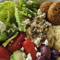 Easy and fresh! Added falafel, lemon juice, olive oil and s/p.  Allow additional time to cool couscous before building bowl. 
