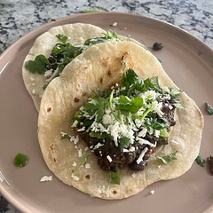 These tacos are to die for, seriously one of the best vegetarian recipes I’ve ever made. I used spinach instead of kale and left out the corn. I used 2 cans of black beans and 1/3 cup of enchilada sauce. This recipe would work well with lentils as filling too. The green sauce was awesome and will definitely make it again!