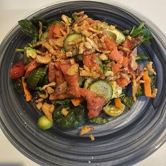 Made with Tuscan blend veggies, vinegar soaked cucumbers, smoke eyed salmon, and onion toppings instead of red onions.