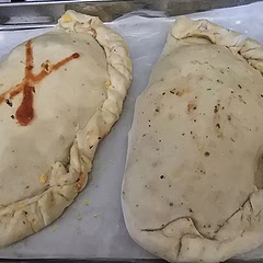 Made my own pizza base and added Italian herbs into the mix for added flavour.