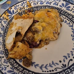 Despite having exact spice measurements, it was claimed to be spicy.
But DO have to say, it's a bit hard to cut through since it's double layered. I had a smaller casserole dish than what they used so I used less tortillas (6).