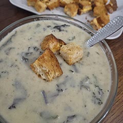 Oh my goodness, the sweet garlic potato flavor combo is so comforting! I used an extra cup of broth, 2 large bulbs of fresh garlic from the farmers market, and a couple cups of chopped kale from the garden that was stirred in after blending and left to simmer for a few additional minites. I also cut the potato into smaller pieces for even cooking and easier blending and added a sprinkle of cayenne. I topped this with grilled cheese croutons (grilled cheese made in the air fryer, removed to cool slightly, chopped up and thrown back in to crisp up for a few) and will definitely be making that a new soup topping staple.