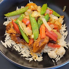 We really enjoyed this! We left out the bourbon and used a substitute. Still flavorful and super easy to make. We ate for two, and we had leftovers. It would probably feed 3-4 people. Took less than an hour to make.