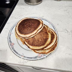 Always a fluffy and delicious classic! Just whisk well with a fork. This time I sprayed with olive oil spray, cooked my first pancake medium heat, then drizzled more olive oil alongside future batter. It makes 4 pancakes so I doubled it for 8.