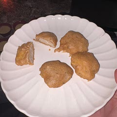 These are great, I cooked them in the oven at 350. I added more seasoning paprika and oregano and instead of corn flour I used corn meal. I only made a portion of them for the first batch and they were not crispy. Will broil them next time. It is time consuming and I feel like flash freezing the nuggets before dipping them will make the dipping process easier .